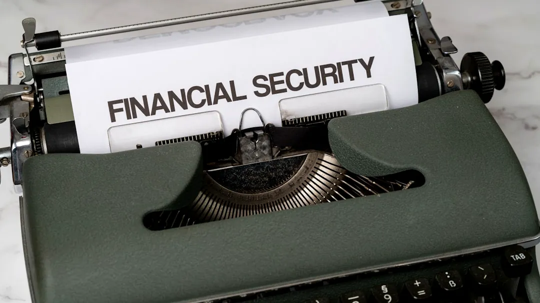a close up of a typewriter with a financial security sign on it