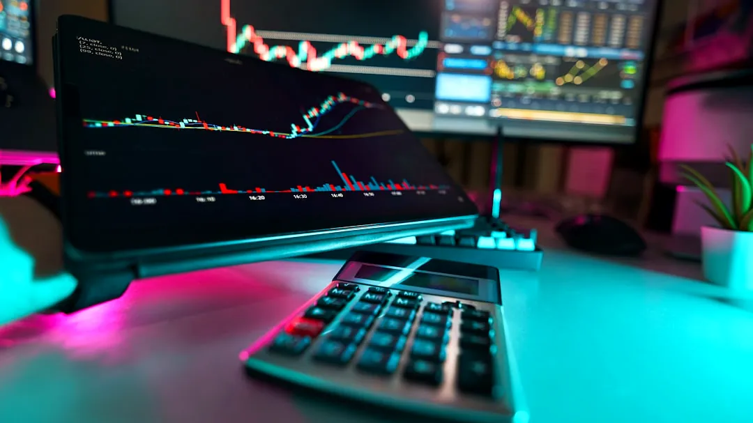 A desk with a keyboard and a monitor