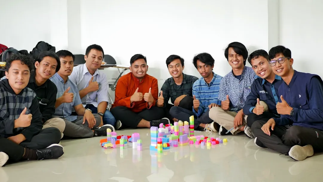 a group of men sitting next to each other