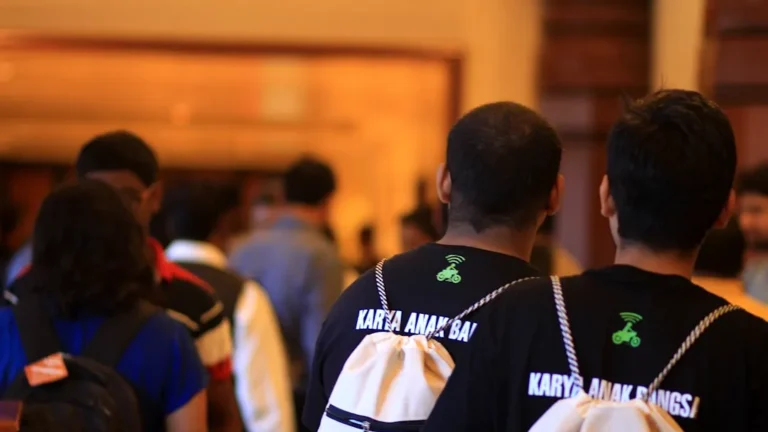 a group of people standing next to each other