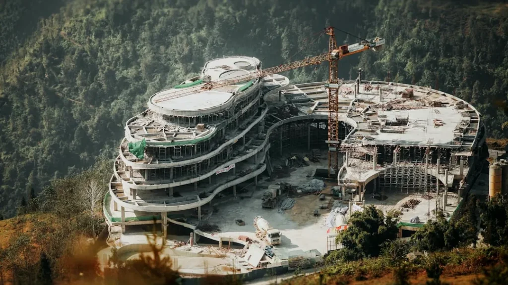 a large building with a crane on top of it