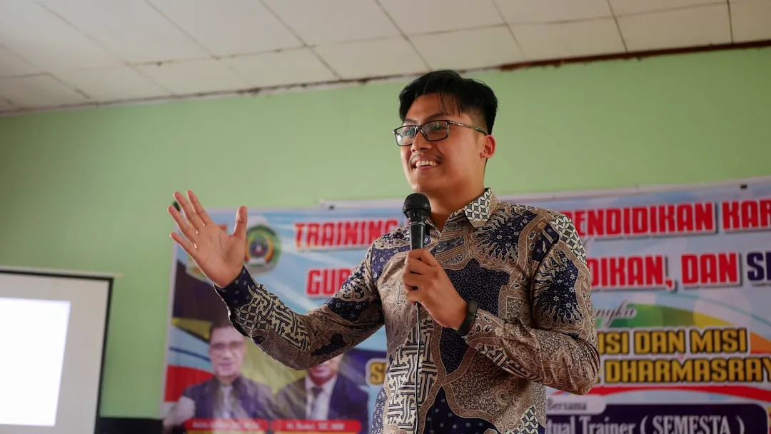 a man standing in front of a microphone