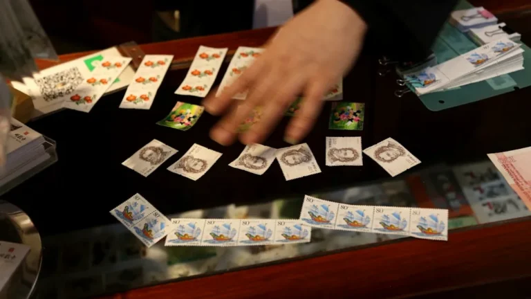 a person playing a game of cards on a table