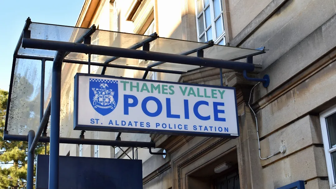 a street sign hanging from the side of a building