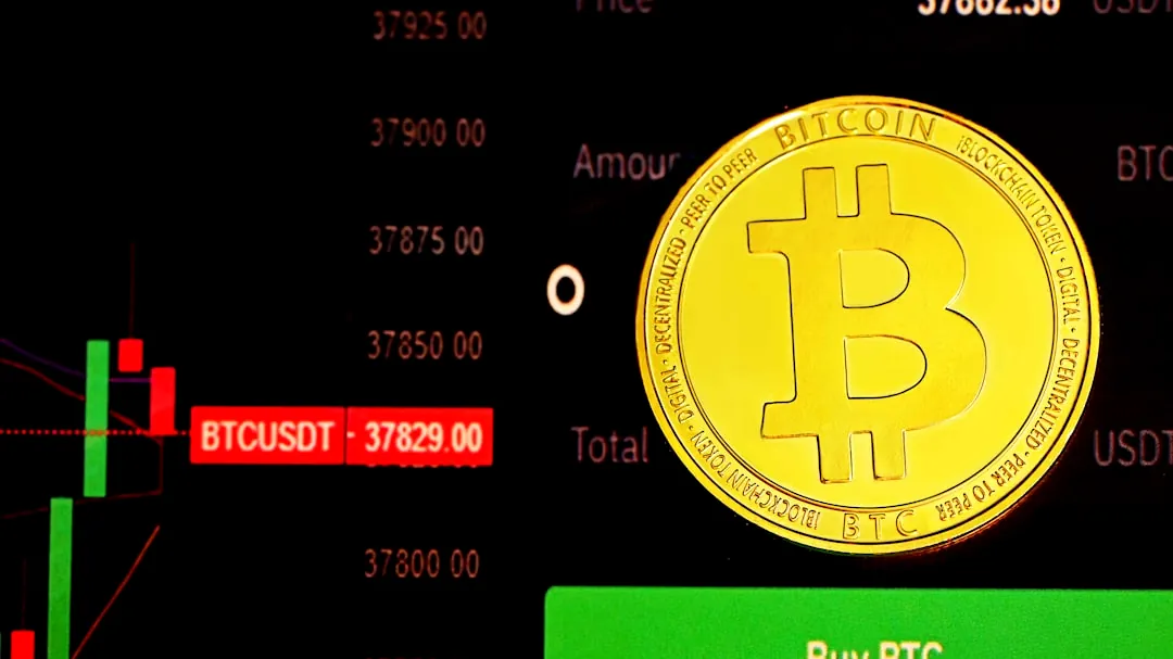 gold and black round logo