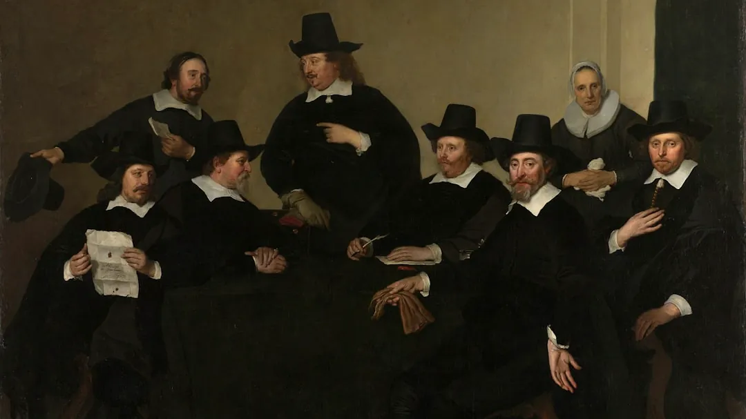 group of men in black suit