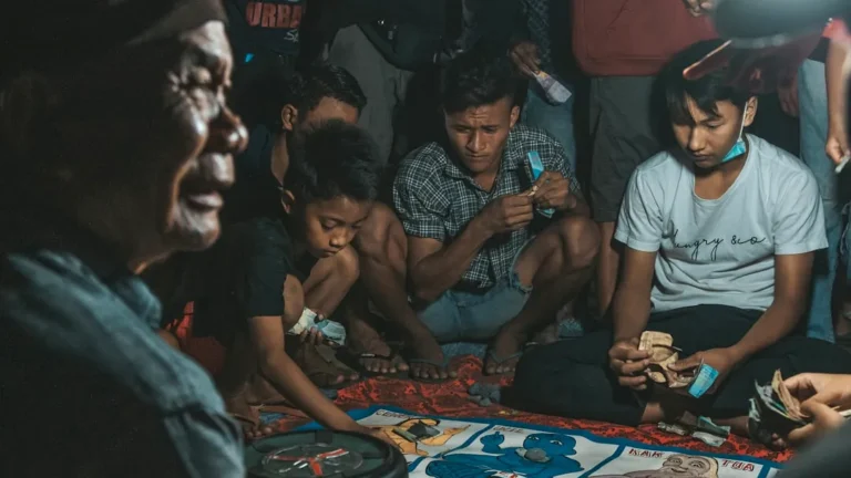 people sitting on floor inside room