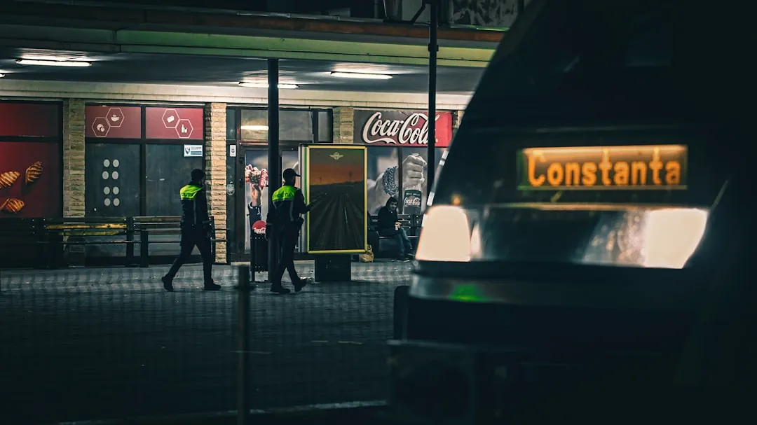 Train destination sign reads constanta at night.