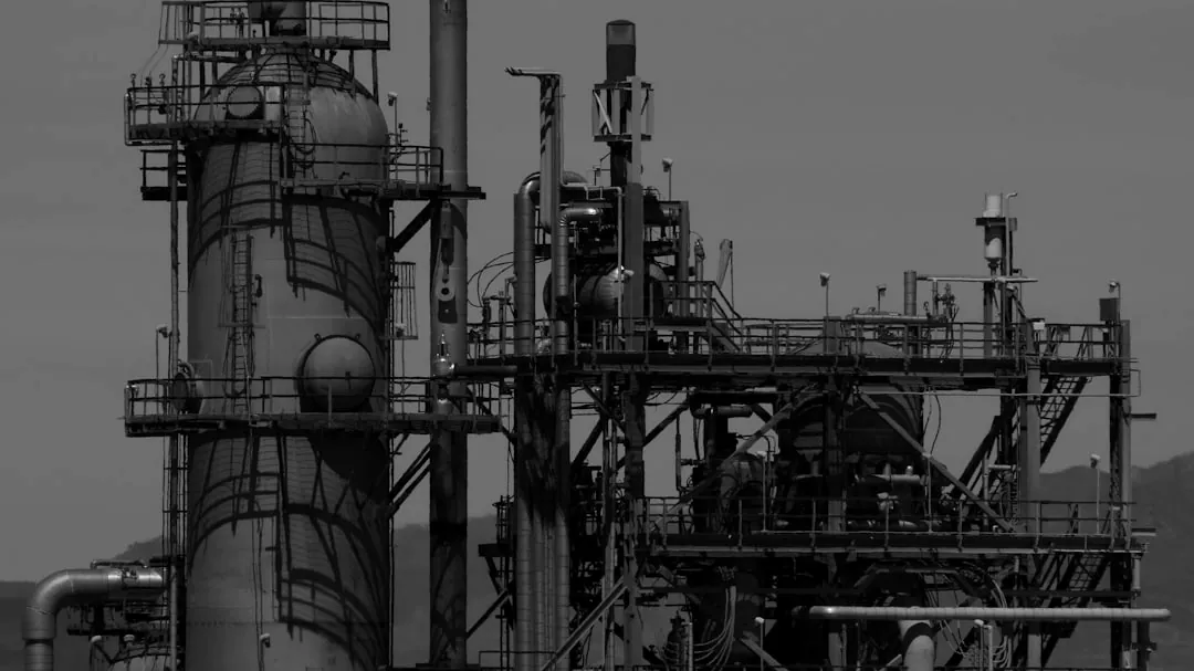 a black and white photo of an industrial plant