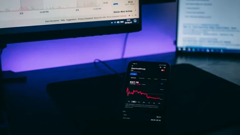 black android smartphone on black laptop computer