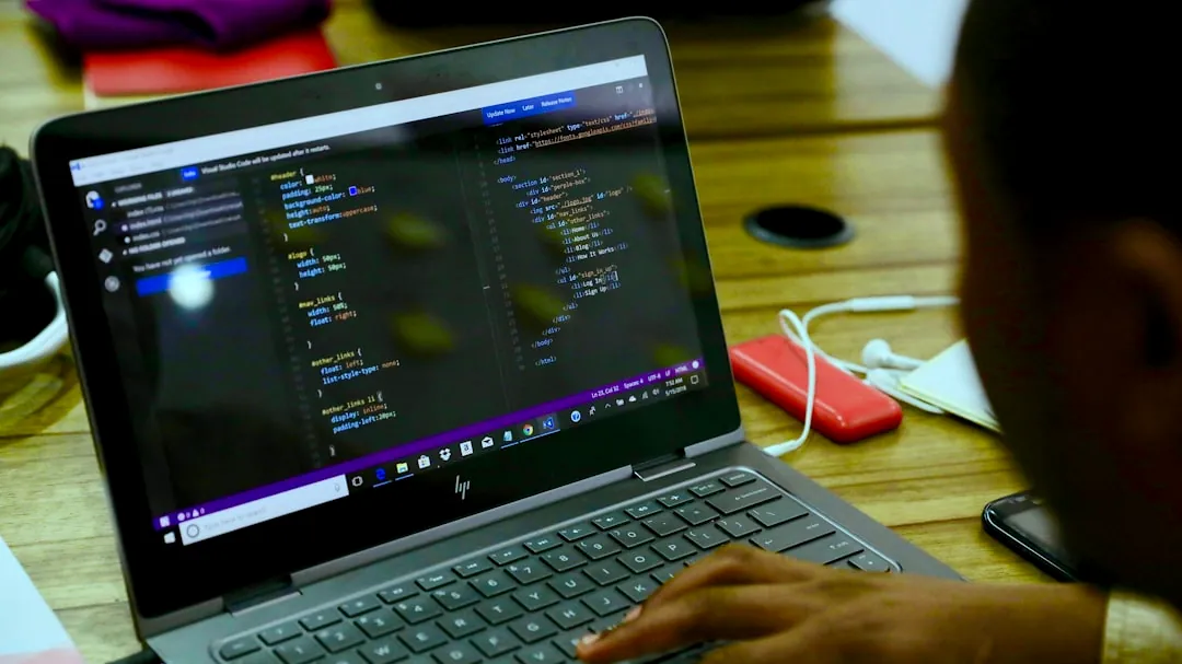 black HP laptop displaying C++ language