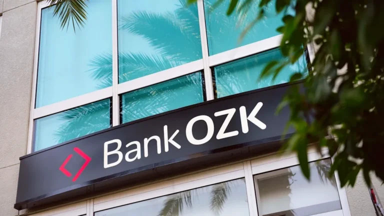 a branch of a bank with a palm tree in front of it