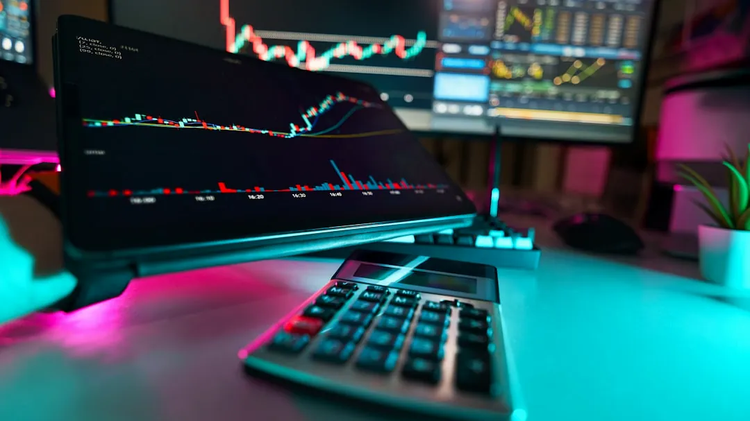 A desk with a keyboard and a monitor