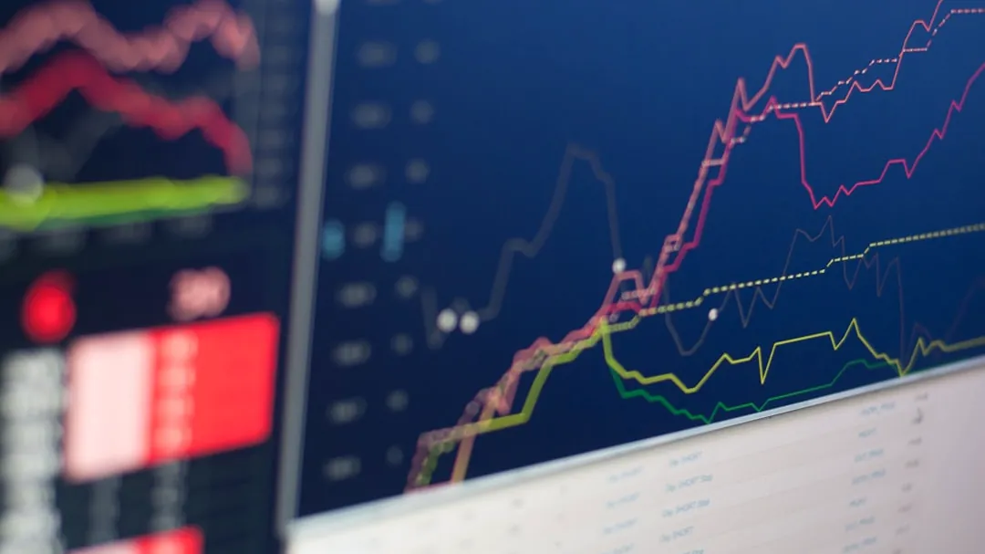 close-up photo of monitor displaying graph